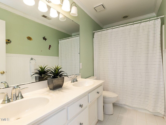 5032 Salem Ridge Rd, Holly Springs, NC 27540 - bathroom with double vanity, crown molding, wainscoting, a shower with curtain, and tile patterned flooring