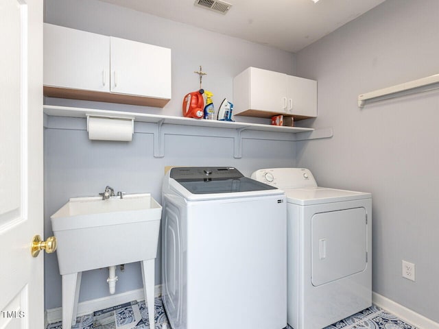 5032 Salem Ridge Rd, Holly Springs, NC 27540 - laundry room featuring cabinet space and washer and dryer