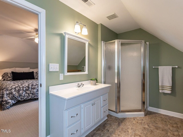 5032 Salem Ridge Rd, Holly Springs, NC 27540 - bathroom with vaulted ceiling, vanity, a stall shower, connected bathroom, and ceiling fan