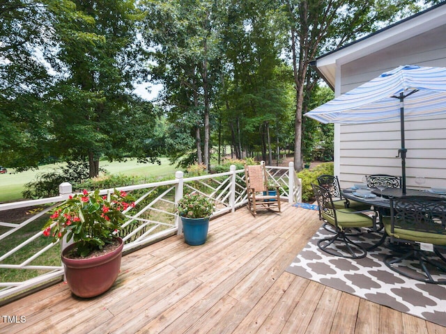 5032 Salem Ridge Rd, Holly Springs, NC 27540 - deck with outdoor dining area and view of wooded area