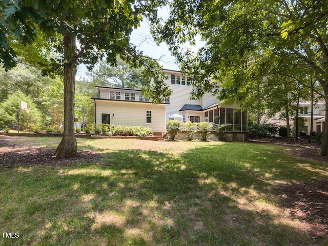 5032 Salem Ridge Rd, Holly Springs, NC 27540 - back of house with a sunroom and a yard
