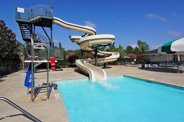5032 Salem Ridge Rd, Holly Springs, NC 27540 - community pool featuring a water slide, stairs, and a patio