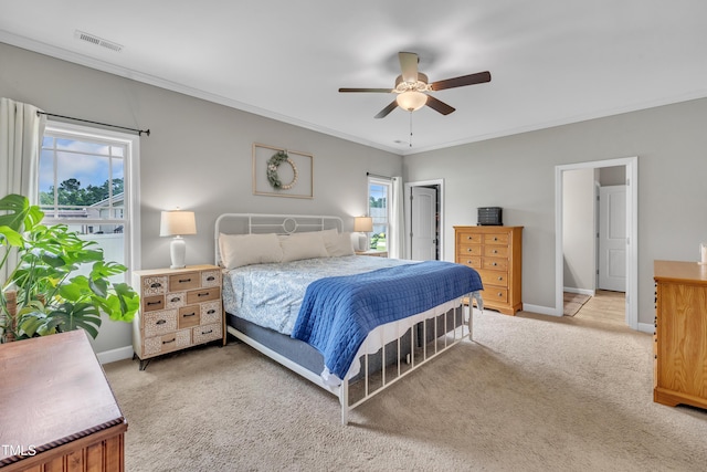 115 Creech Place Dr, Benson, NC 27504 - bedroom featuring multiple windows, light carpet, ornamental molding, and a ceiling fan