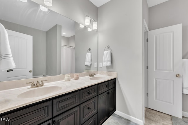115 Creech Place Dr, Benson, NC 27504 - full bath with double vanity and baseboards