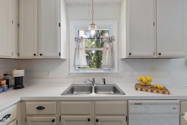 107 Leighton Pl, Knightdale, NC 27545 - kitchen featuring white dishwasher, light countertops, white cabinets, and decorative light fixtures