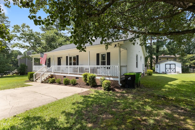 107 Leighton Pl, Knightdale, NC 27545 - view of front of house featuring covered porch, a storage shed, crawl space, and a front yard