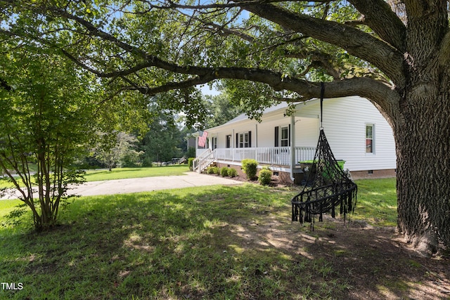 107 Leighton Pl, Knightdale, NC 27545 - view of front of house with crawl space, a porch, and a front lawn