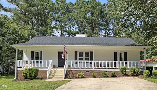 107 Leighton Pl, Knightdale, NC 27545 - view of front facade featuring a porch, a chimney, crawl space, and a shingled roof