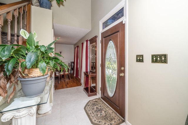 501 Dandelion Ct, Raleigh, NC 27610 - entryway featuring light tile patterned floors