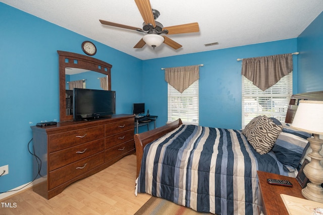 501 Dandelion Ct, Raleigh, NC 27610 - bedroom featuring light wood finished floors and ceiling fan