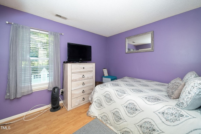 501 Dandelion Ct, Raleigh, NC 27610 - bedroom featuring wood finished floors and baseboards