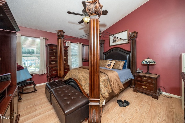 501 Dandelion Ct, Raleigh, NC 27610 - bedroom with vaulted ceiling, wood finished floors, and a ceiling fan