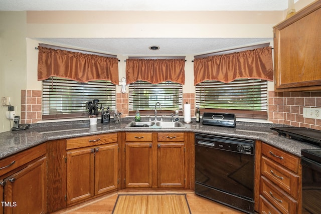 501 Dandelion Ct, Raleigh, NC 27610 - kitchen featuring dishwasher, decorative backsplash, brown cabinetry, light wood-style flooring, and range