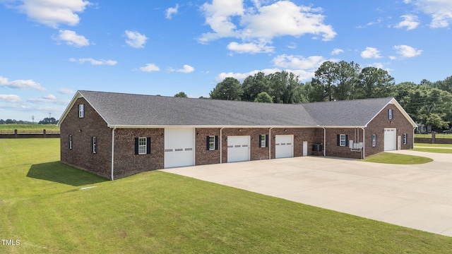 7390 NC-50, Angier, NC 27501 - view of front of house with concrete driveway, a front lawn, and brick siding