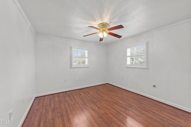 7390 NC-50, Angier, NC 27501 - unfurnished room with healthy amount of natural light, ornamental molding, ceiling fan, wood finished floors, and a textured ceiling