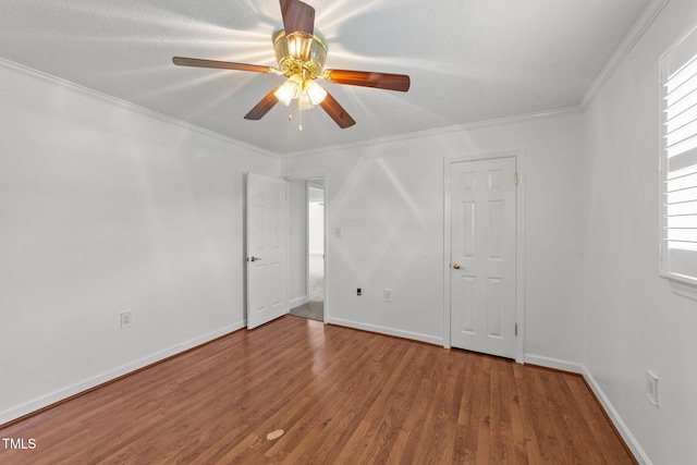 7390 NC-50, Angier, NC 27501 - empty room with wood finished floors, ceiling fan, and crown molding