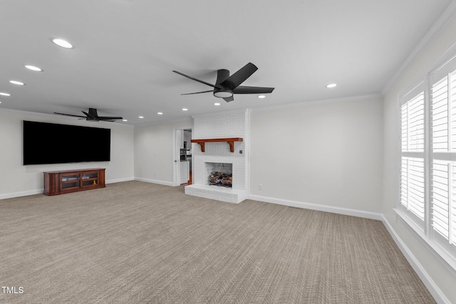7390 NC-50, Angier, NC 27501 - unfurnished living room featuring ceiling fan, ornamental molding, carpet flooring, recessed lighting, and a brick fireplace