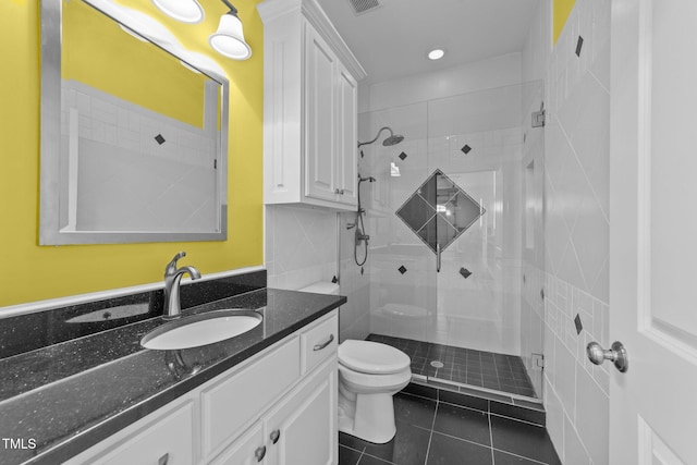 7390 NC-50, Angier, NC 27501 - full bathroom featuring vanity, a shower stall, tile patterned floors, and recessed lighting