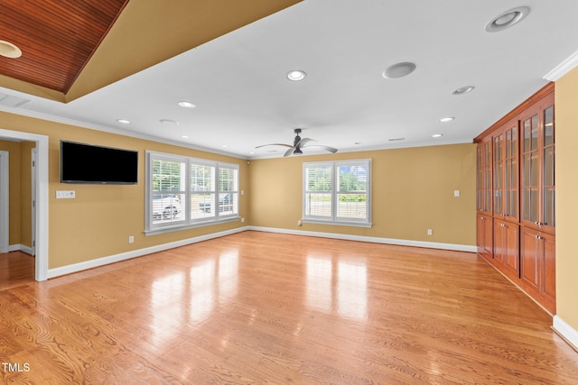 7390 NC-50, Angier, NC 27501 - unfurnished living room with crown molding, a ceiling fan, recessed lighting, light wood-style floors, and lofted ceiling
