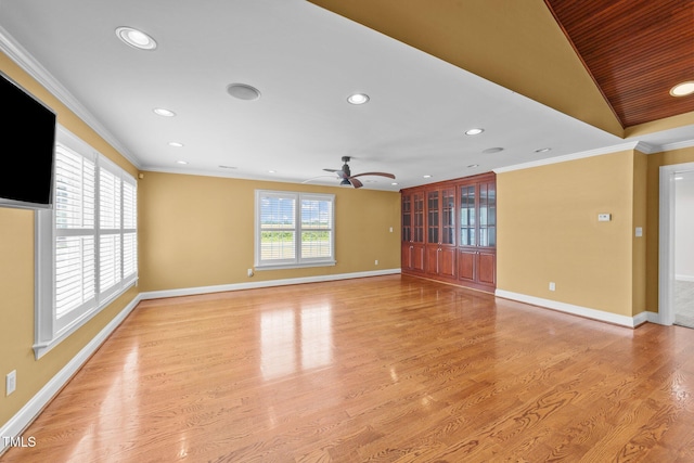7390 NC-50, Angier, NC 27501 - unfurnished living room featuring a ceiling fan, recessed lighting, light wood-style floors, and crown molding