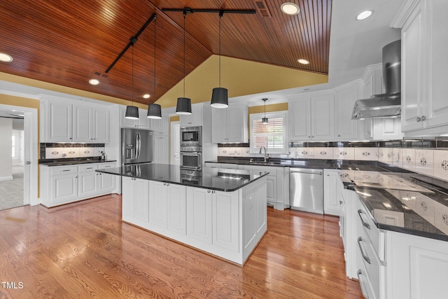 7390 NC-50, Angier, NC 27501 - kitchen with wood ceiling, appliances with stainless steel finishes, light wood finished floors, white cabinets, and vaulted ceiling