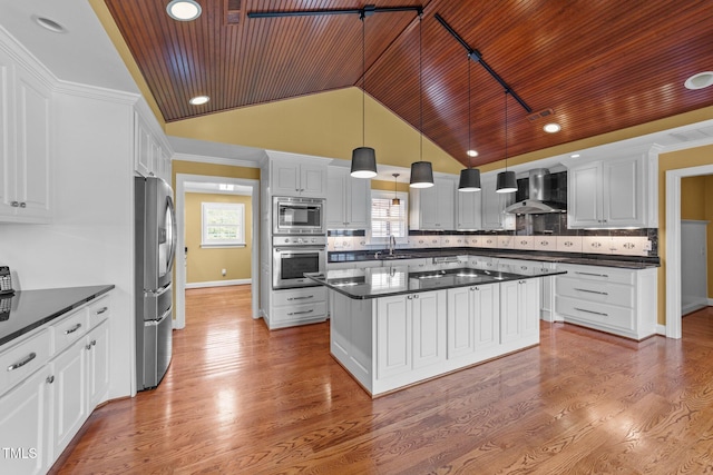 7390 NC-50, Angier, NC 27501 - kitchen with wall chimney exhaust hood, wooden ceiling, stainless steel appliances, dark countertops, and vaulted ceiling