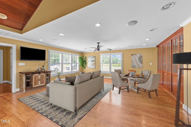 7390 NC-50, Angier, NC 27501 - living room with ornamental molding, recessed lighting, a ceiling fan, light wood finished floors, and vaulted ceiling