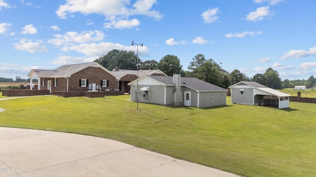 7390 NC-50, Angier, NC 27501 - view of green lawn featuring an outbuilding