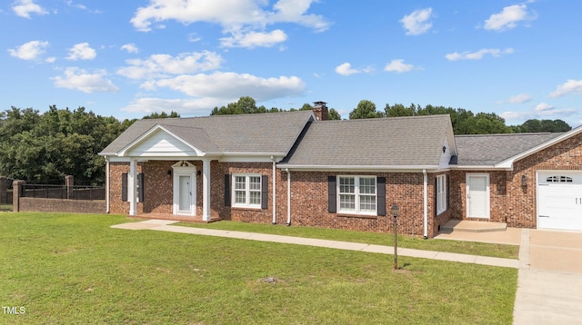 7390 NC-50, Angier, NC 27501 - view of front of house featuring brick siding, concrete driveway, a garage, a chimney, and a shingled roof