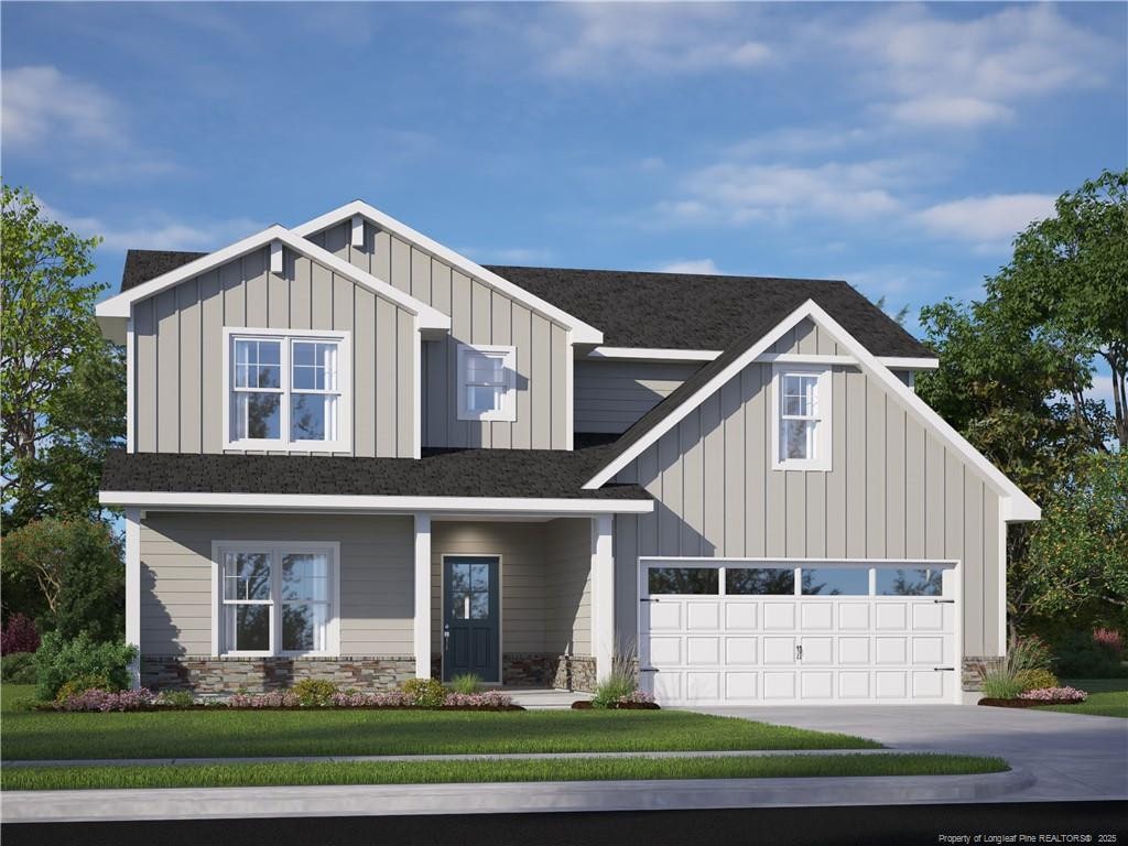 470 Crichton Ct, Fayetteville, NC 28311 - craftsman-style house with board and batten siding, driveway, roof with shingles, a front yard, and stone siding