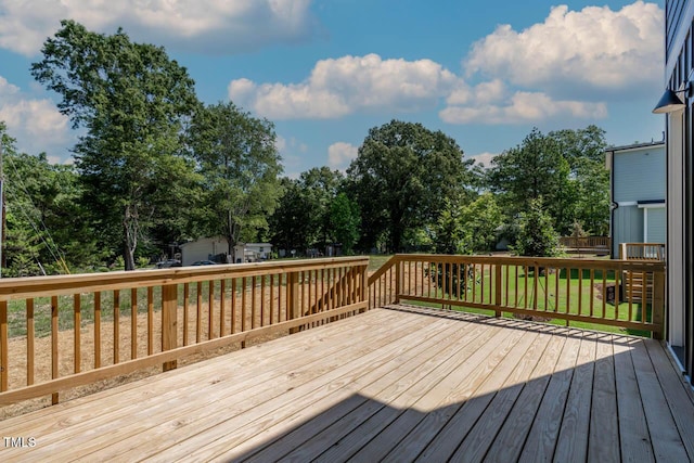 140 E End Ave, Durham, NC 27703 - wooden deck featuring view of wooded area and a lawn