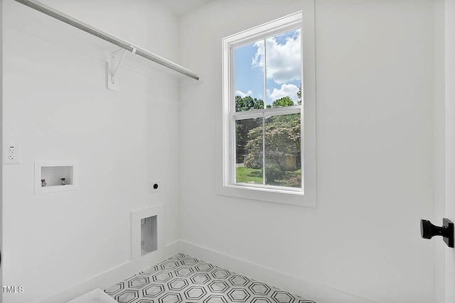 140 E End Ave, Durham, NC 27703 - laundry area with plenty of natural light, hookup for a washing machine, hookup for an electric dryer, and tile patterned flooring