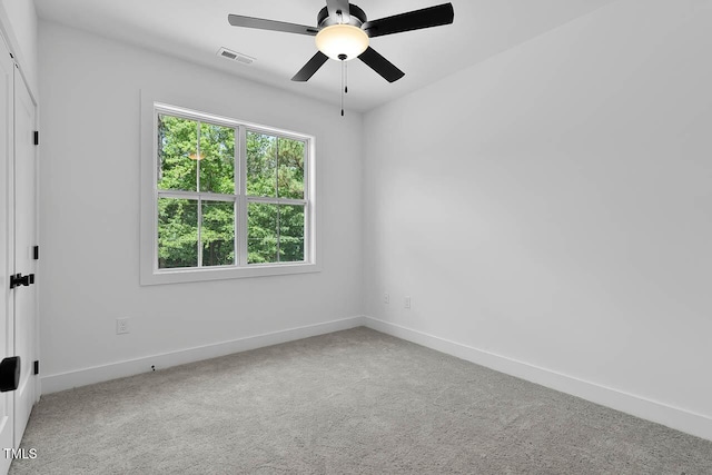 140 E End Ave, Durham, NC 27703 - carpeted spare room featuring baseboards and a ceiling fan