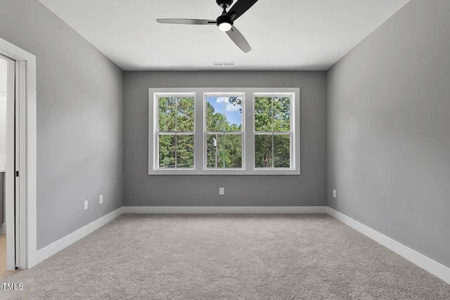 140 E End Ave, Durham, NC 27703 - empty room with ceiling fan and carpet floors