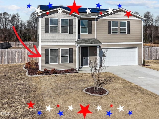 9059 Shallow Creek Trl, Bailey, NC 27807 - view of front of home with a garage, solar panels, concrete driveway, and roof with shingles