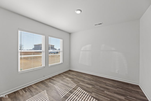9059 Shallow Creek Trl, Bailey, NC 27807 - empty room with dark wood-style floors and baseboards