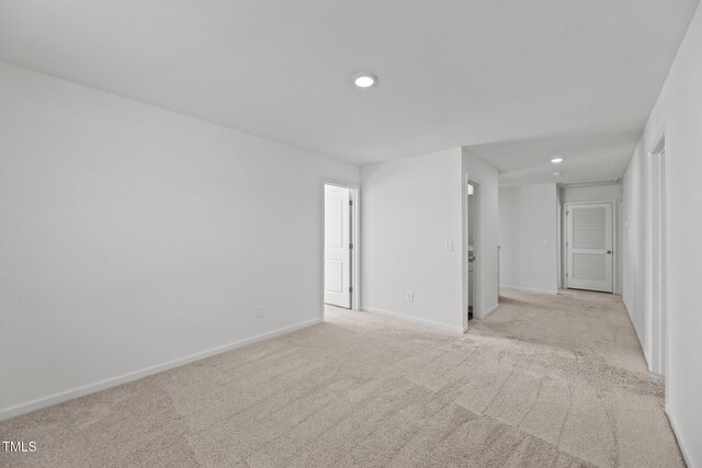9059 Shallow Creek Trl, Bailey, NC 27807 - empty room with light colored carpet and recessed lighting