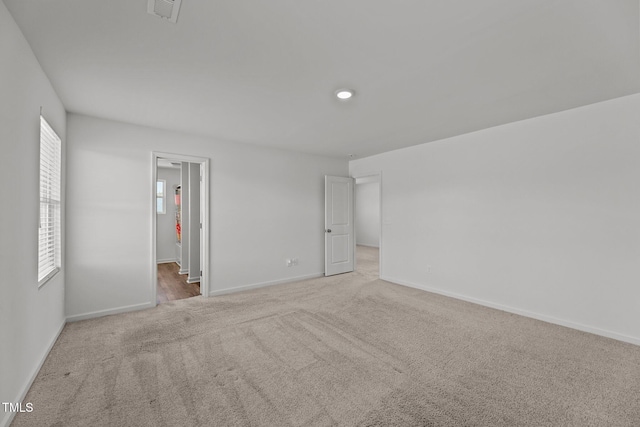 9059 Shallow Creek Trl, Bailey, NC 27807 - unfurnished bedroom featuring light carpet and ensuite bath