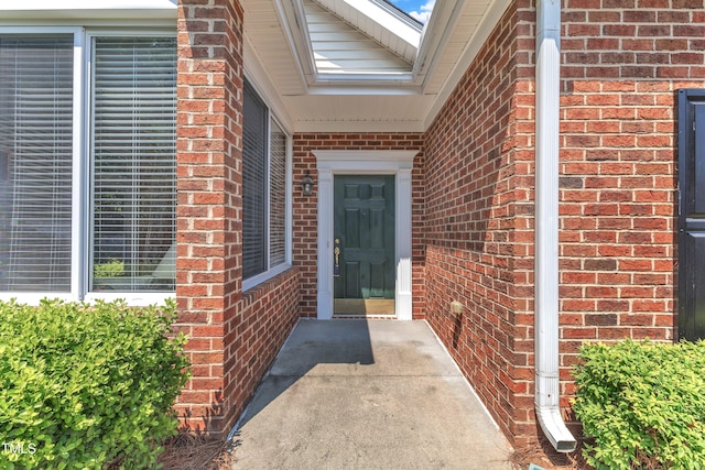4710 Ludwell Branch Ct, Raleigh, NC 27612 - doorway to property with brick siding