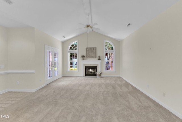 4710 Ludwell Branch Ct, Raleigh, NC 27612 - unfurnished living room with carpet flooring, ceiling fan, vaulted ceiling, and a fireplace