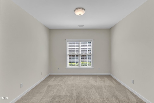 4710 Ludwell Branch Ct, Raleigh, NC 27612 - unfurnished room featuring light colored carpet and baseboards