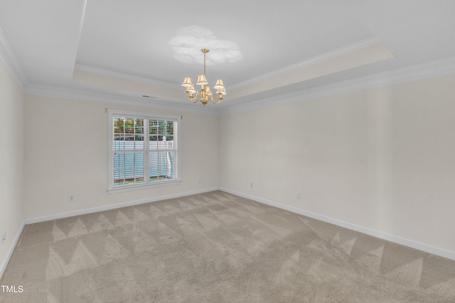 4710 Ludwell Branch Ct, Raleigh, NC 27612 - unfurnished room featuring a tray ceiling, a chandelier, ornamental molding, and carpet floors
