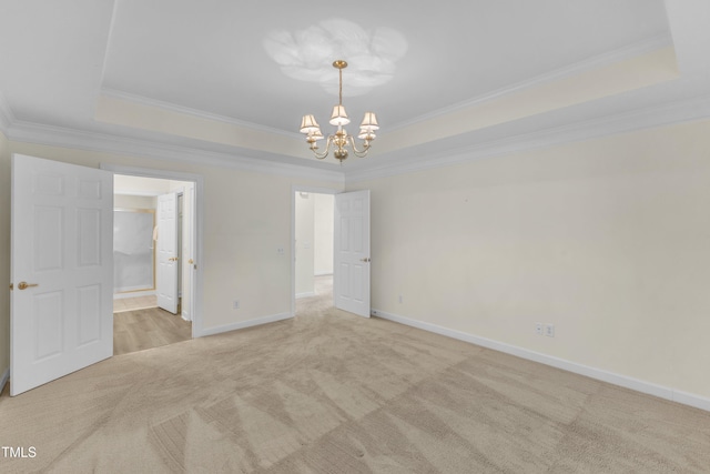 4710 Ludwell Branch Ct, Raleigh, NC 27612 - unfurnished room featuring a raised ceiling, carpet floors, a chandelier, and crown molding