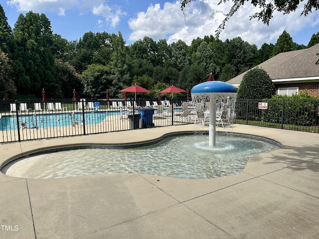 4710 Ludwell Branch Ct, Raleigh, NC 27612 - community pool featuring a patio area