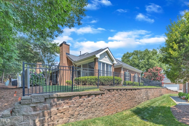 4710 Ludwell Branch Ct, Raleigh, NC 27612 - back of property with brick siding and a chimney