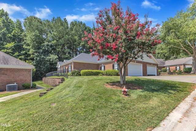4710 Ludwell Branch Ct, Raleigh, NC 27612 - view of front of property featuring brick siding, a front yard, and driveway