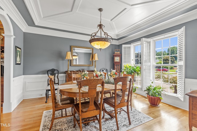 2512 Stewart St, Fuquay Varina, NC 27526 - dining space featuring light wood-style floors, wainscoting, arched walkways, ornamental molding, and ornate columns