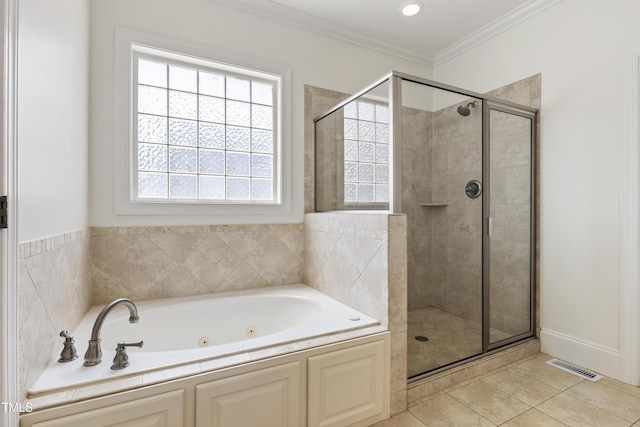 2512 Stewart St, Fuquay Varina, NC 27526 - full bath featuring a whirlpool tub, a shower stall, tile patterned flooring, and ornamental molding