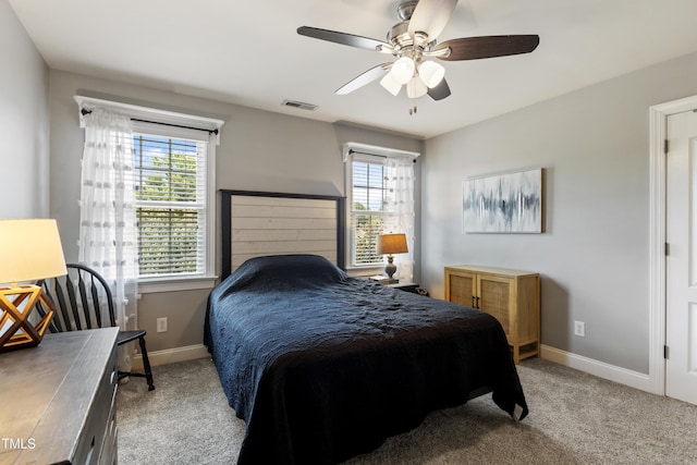 2512 Stewart St, Fuquay Varina, NC 27526 - bedroom featuring multiple windows, carpet flooring, and a ceiling fan