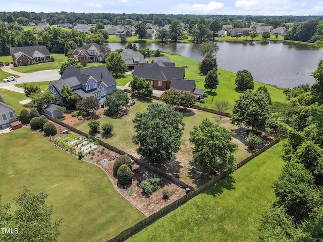 2512 Stewart St, Fuquay Varina, NC 27526 - aerial perspective of suburban area featuring a large body of water and a tree filled landscape